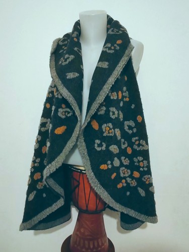 Gilet long sans manches très - long,