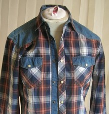 Chemise à carreaux et manches