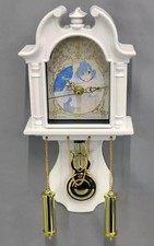 Re: horloge murale pendule