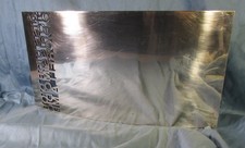 Curieuse  lourde plaque bombée en acier découpé  déco de vitrine Dior Christofle