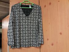 Blouse noir et blanc manches longues