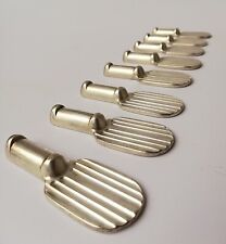 Christofle 8 porte-couteaux en métal argenté - modèle raquette Luc Lanel