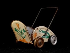 Ancien jouet landau poussette miniature tôle tulipe poupée 50 style penny toy