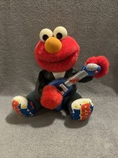 Peluche doudou Rock Guitare Elmo TYCO Preschool Toys Ne Fonctionne Pas