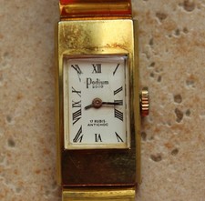 Ancienne montre FEMME mécanique  MARQUE:PODIUM 2000 17 RUBIS ANTICHOC Plaqué or.