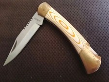 Couteau Pliant Stainless Verrouillage à Pompe 