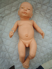 POUPEE NOUVEAU NE BERJUSA  SEXUE GARCON STYLE REBORN DE 50 CM AVEC SON BRACELET