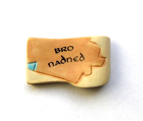 Fève pièce puzzle carte - de,