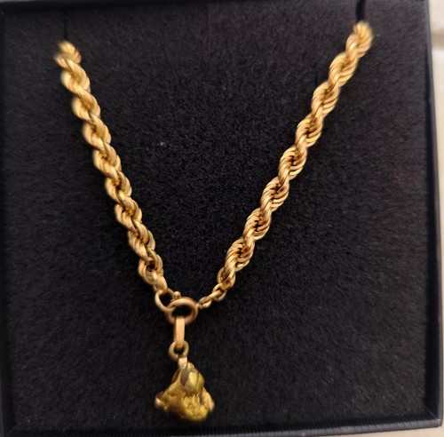 Collier carats 750 - or,