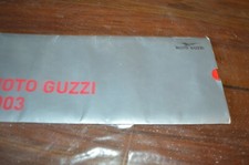 Original 2003 Moto Guzzi motorcycle range brochure / poster État :-- “This motor