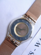 SWATCH Skin SFK240M Tri-Gold