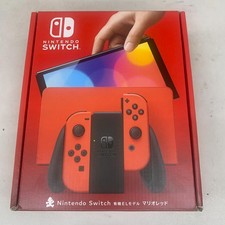 Modèle OLED de Nintendo Switch : Mario Red Edition Joy-Con boîte ouverte rouge