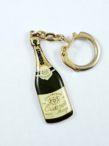 Porte cles joli champagne - -,
