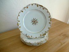 QUATRE ASSIETTES PORCELAINE DE