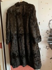 manteau long très bon état taille 42  (longueur 115 cm) fourrure renard marron  