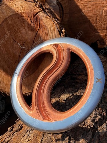 Hand forged yin - hand, yang