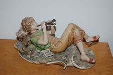 Capodimonte figurine signée Maggioni , joueur de flute , garçon ,musicien Italie