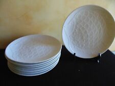 8 assiettes en porcelaine motif poisson D.  24 cm