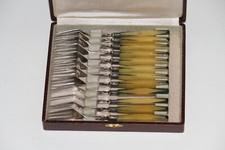Coffret 12 fourchettes à dessert métal bakélite anciennes Tournier Charleville