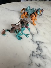 LOT 2 FIGURINES CHAP MEI DINOSAURE VELOCIRAPTOR  ET TIGRE AUX DENTS DE SABRE