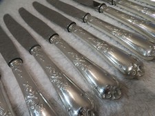 12 couteaux de table métal