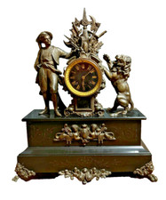 Pendule ancienne XIXème à décor de Turc et Lion en bronze, régule & marbre noir