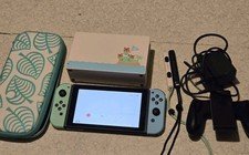 Nintendo Switch 32 Go Console Portable avec Manettes Version Animal Crossing Tbe