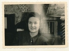 Vintage photo - Pretty woman in parlor with light effect