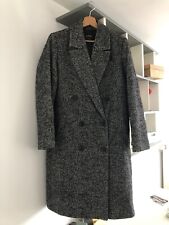 manteau chevrons blanc et noir