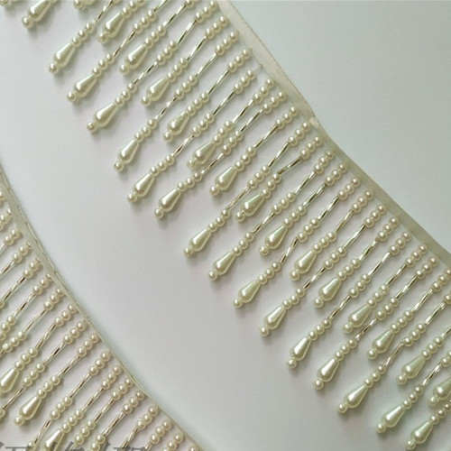 Bordure franges perles - À, en