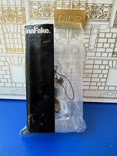 kaws passing through keychain