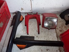 lot plastiques + phare 103