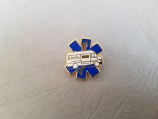 Pin's SECOURS / SANTE - Ambulance - SAMU Signé Arthus Bertrand