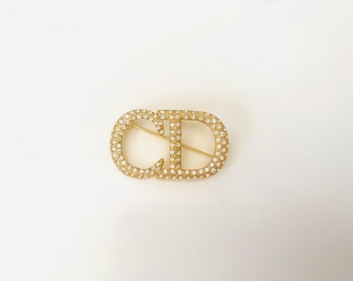 Broche monogramme logo cristal