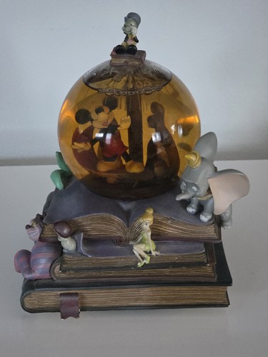 Used disney big snow globe - big,