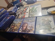 lot de 5 Jeux PS2-combat . + livrets .. Ref 5