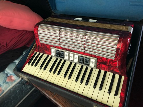 Old red hohner liliput button - old,
