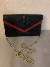 Pochette avec chaîne en cuir