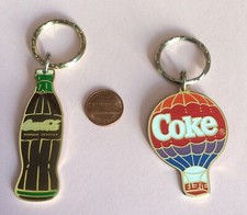 Lot  VINTAGE 2 KEYRING COCA COLA COKE MICHEL OKS ÉDITIONS 1989 COPYRIGHTS