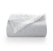 Plaid multifonction pour lit