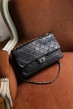 Chanel sac à main modèle 2.55 vintage à double rabat en cuir marron