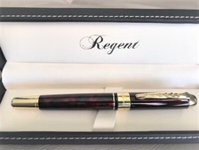 Très beau stylo ROLLER laqué rouge reflets noirs très distingué embouts dorés