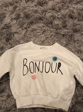 Pull bébé fille à pompons 12-18 mois