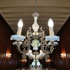 ancien lustre en bronze et faïence florale