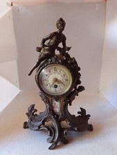 ANCIENNE PENDULE DECOR FEMME ET ENFANT EN REGULE