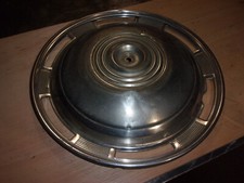 1 enjoliveur peugeot 404 coupé ou cabriolet ou super luxe 