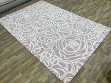 Tapis rose touffeté à la
