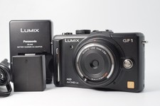 Panasonic LUMIX DMC-GF1 avec objectif Olympus 15mm f/8.0 Body Cap [Near...