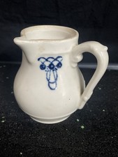 Petit pot  à Lait en faience de St. Uze.