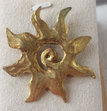 Ancienne broche soleil, en